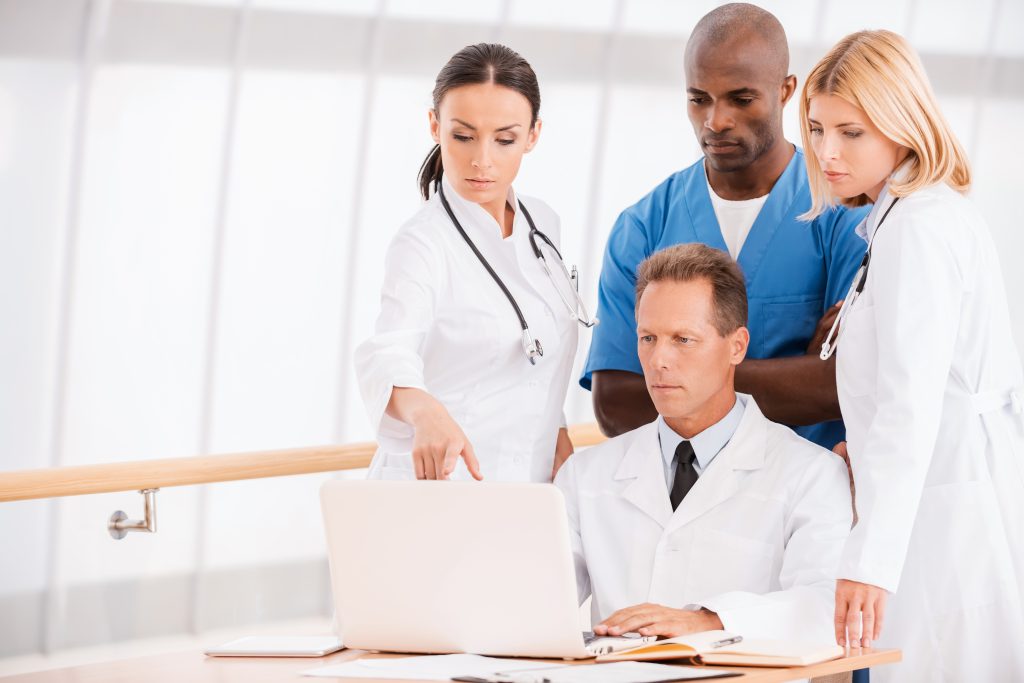 Forensic neurology team reviewing diagnostic findings